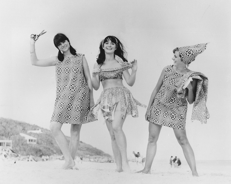 College students wear their mail-order disposable paper dresses manufactured by Scott Paper Co., on their visit to Bermuda on April 27, 1966